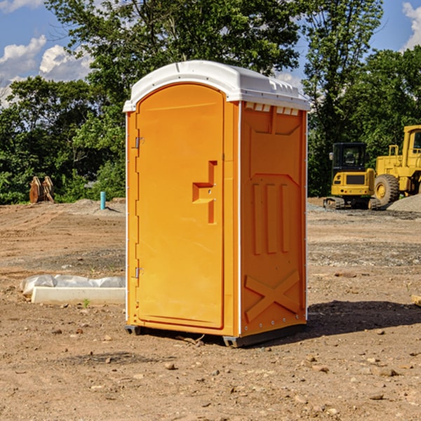 how often are the portable restrooms cleaned and serviced during a rental period in Carlton